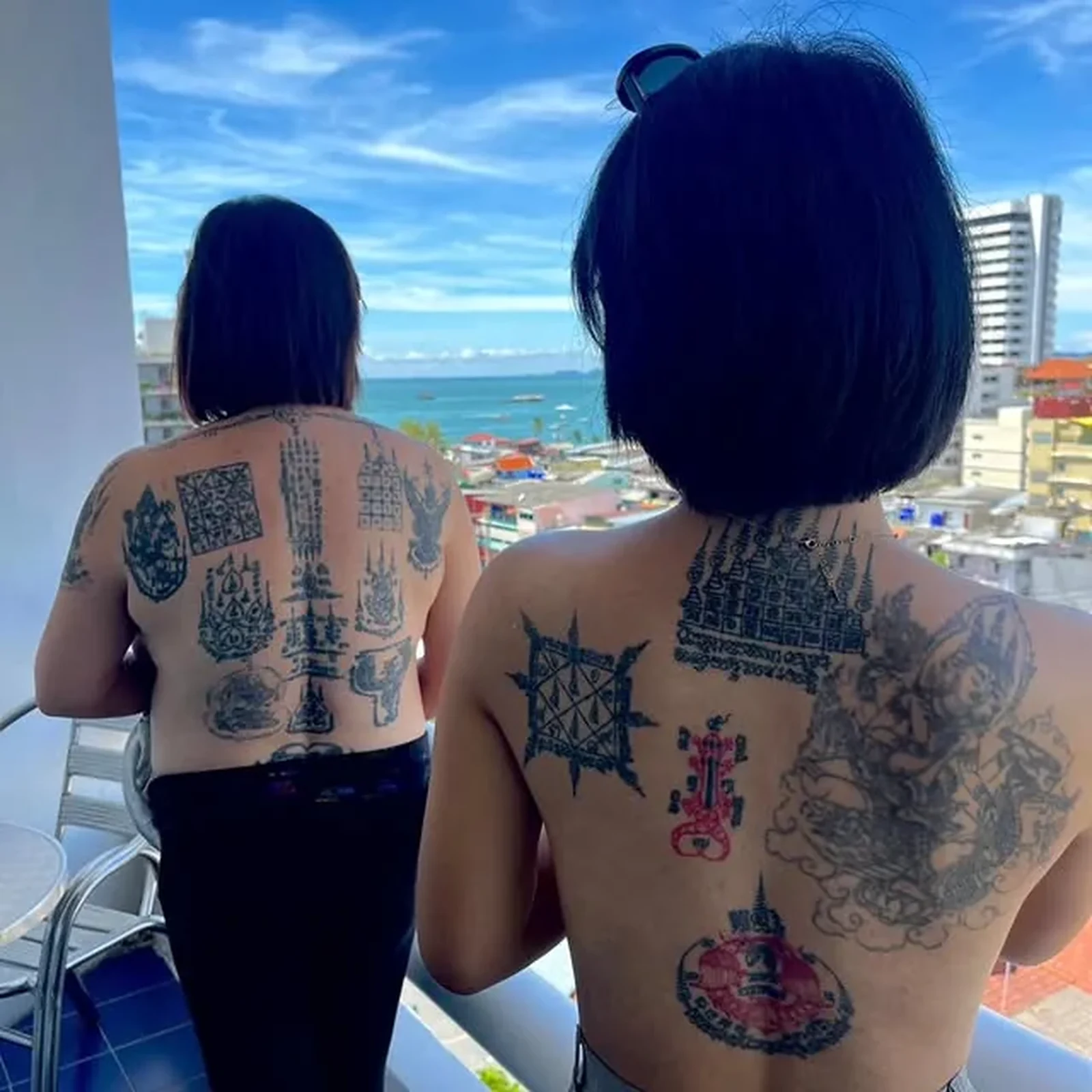 Sak yant — backpiece pair